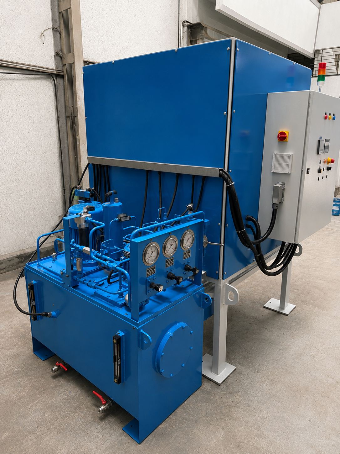 Hydraulic test bench at Suyog Hydrosystems Pune — power unit under pressure test up to 350 bar